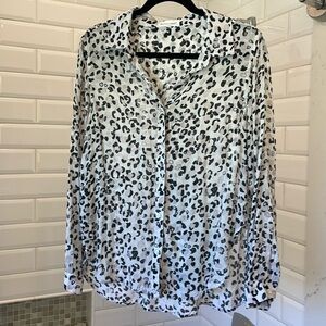 Bella Dahl rayon slightly sheer. Attractive cream colored blouse